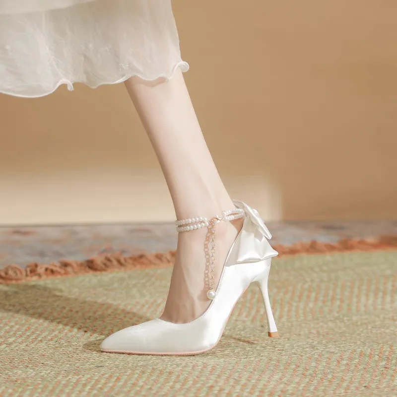 white heels with bows